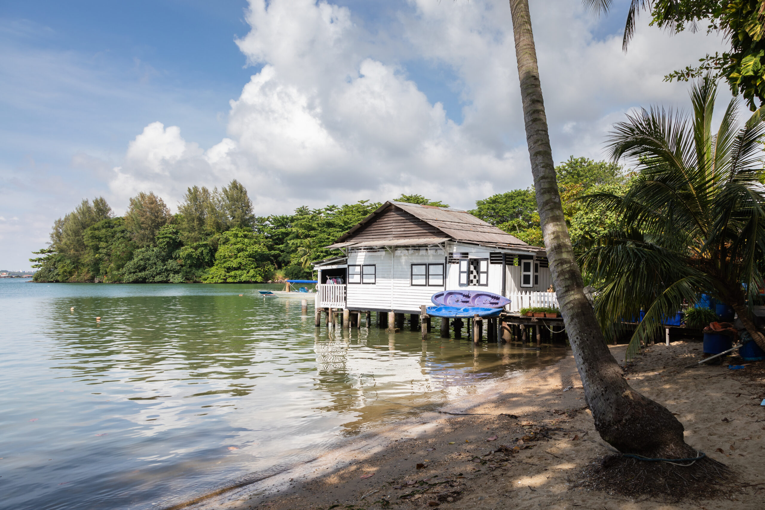 Wooden hut on the beach of Pulau Ubin hidden gems in singapore