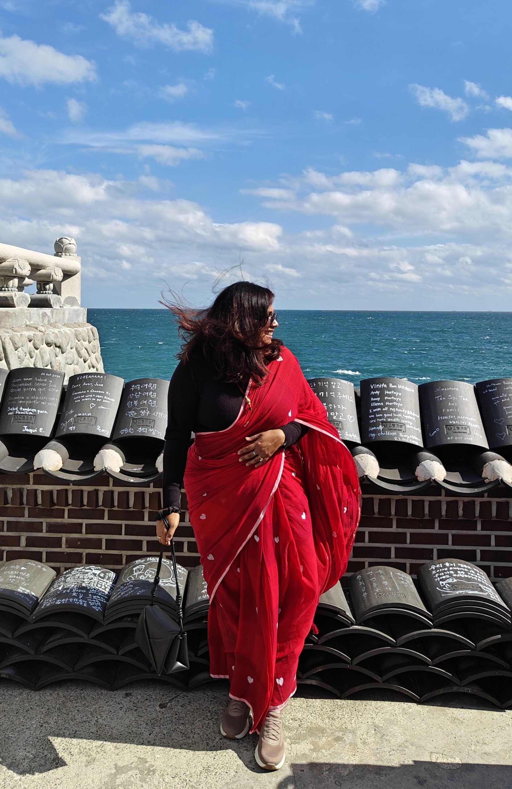 At Haegon Yogonessa Temple in Busan, I had one of those quiet, unforgettable moments, draped in a saree, soaking in the calm.
