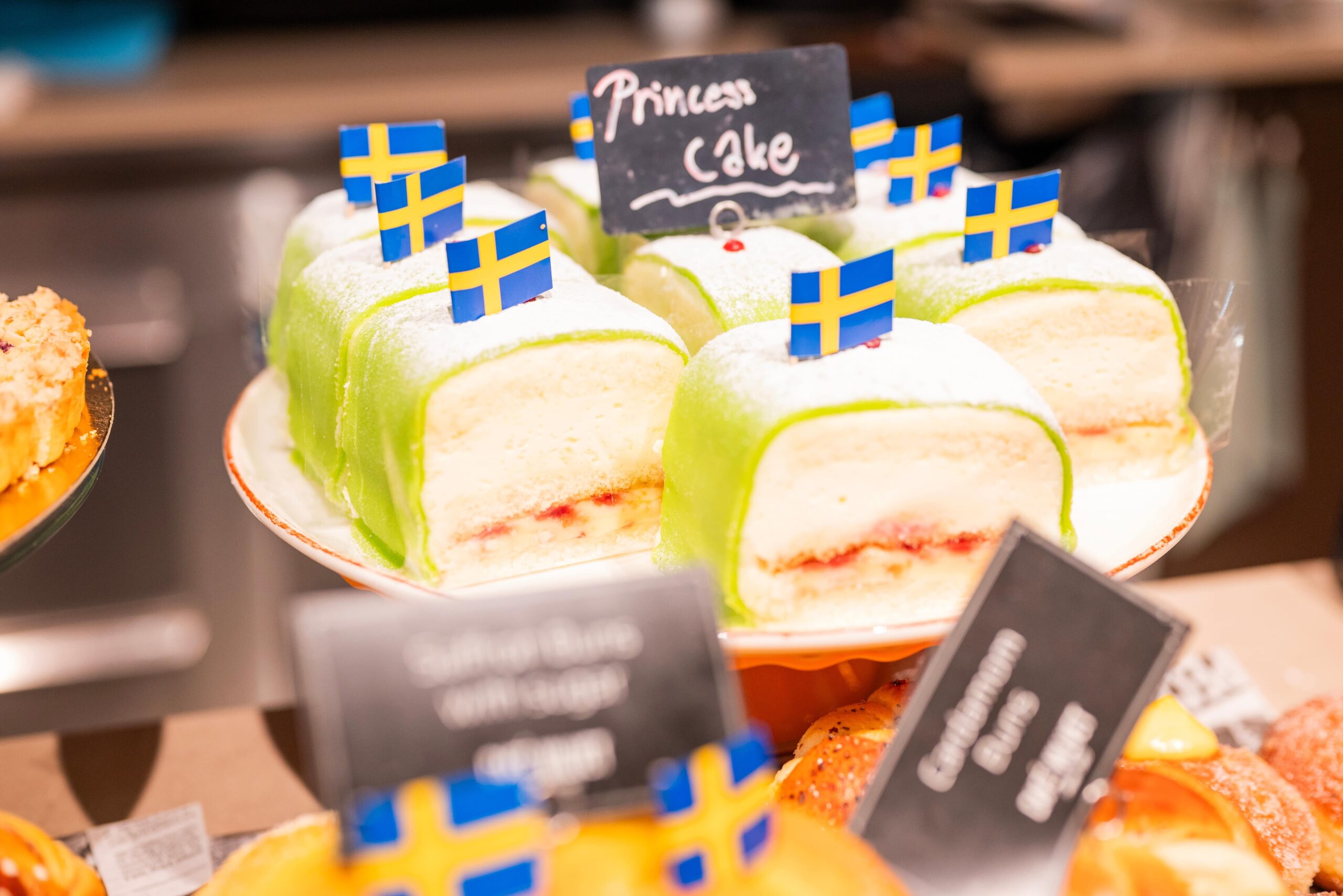 Traditional Swedish dessert Princess cake with green marzipan cover.